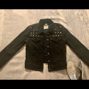 Levi’s black denim jacket.